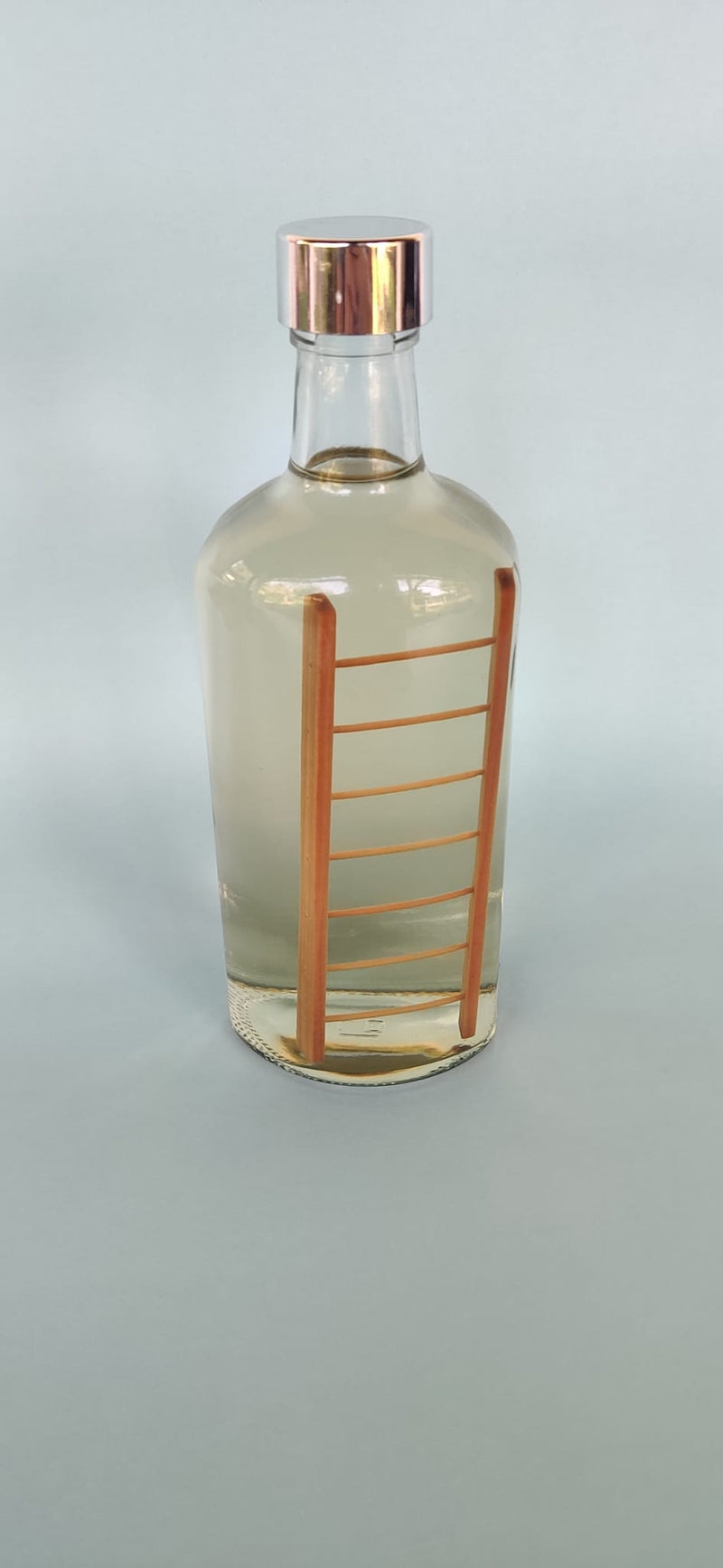 Custom made glass bottle with wooden ladder